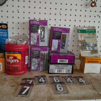 Boxes, and cans full of home hardware - bolts, nuts, nails, and more