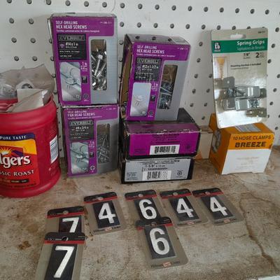 Boxes, and cans full of home hardware - bolts, nuts, nails, and more
