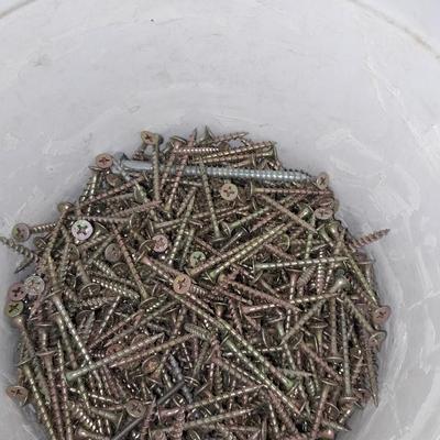 Boxes, and cans full of home hardware - bolts, nuts, nails, and more