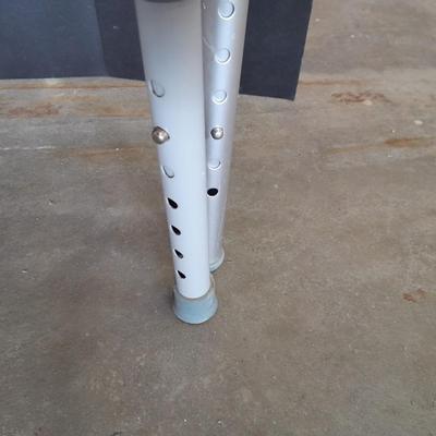 Adjustable legged Mobility walker with a Bariatric Commode