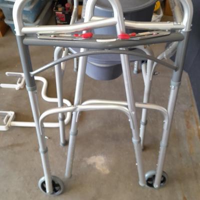 Adjustable legged Mobility walker with a Bariatric Commode