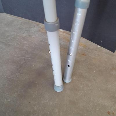 Adjustable legged Mobility walker with a Bariatric Commode