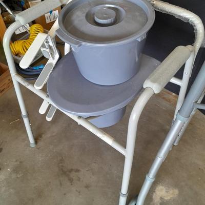 Adjustable legged Mobility walker with a Bariatric Commode