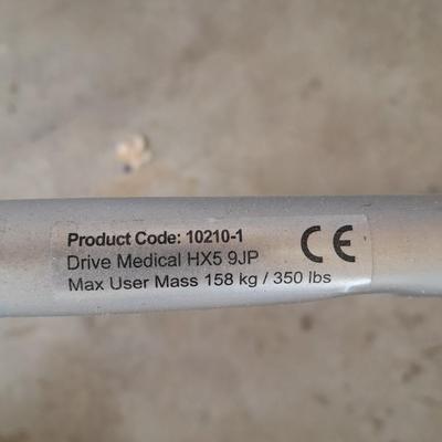 Adjustable legged Mobility walker with a Bariatric Commode