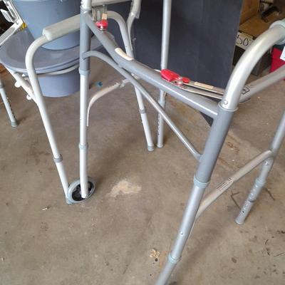 Adjustable legged Mobility walker with a Bariatric Commode