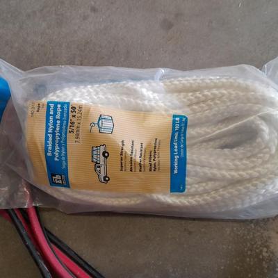 Automotive toolkit in case, jumper cables, rope and siphon hose