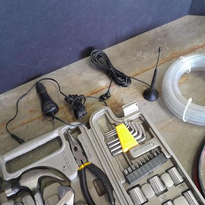 Automotive toolkit in case, jumper cables, rope and siphon hose