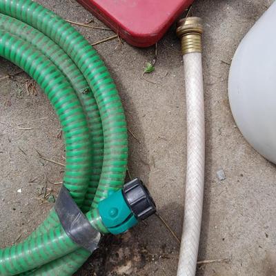 Melnor oscillating sprinkler, Toro hose, attachments, fiberglass yard / garden stakes, and more.