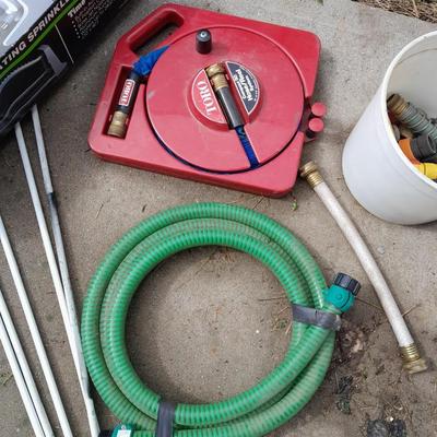 Melnor oscillating sprinkler, Toro hose, attachments, fiberglass yard / garden stakes, and more.