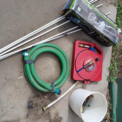 Melnor oscillating sprinkler, Toro hose, attachments, fiberglass yard / garden stakes, and more.