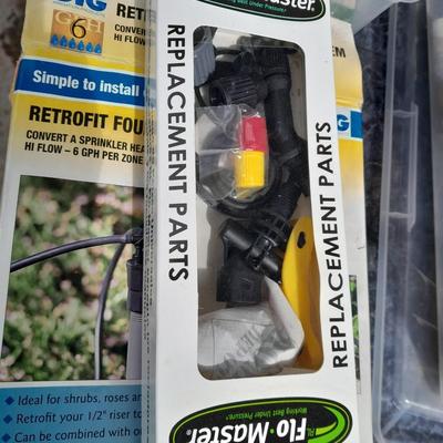 Rain Bird sprinkler heads, Drip line with attachments, and other watering / garden items