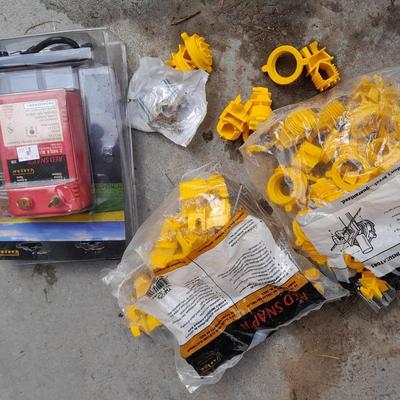 Red snapper electric fence charger with hardware