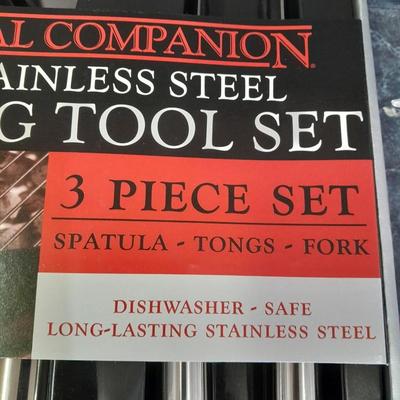 Charcoal Companion stainless steel grilling tool set and several filet knives.