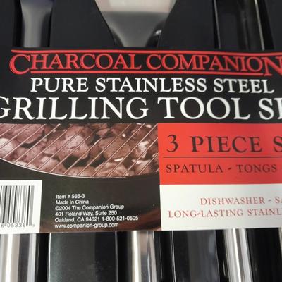Charcoal Companion stainless steel grilling tool set and several filet knives.