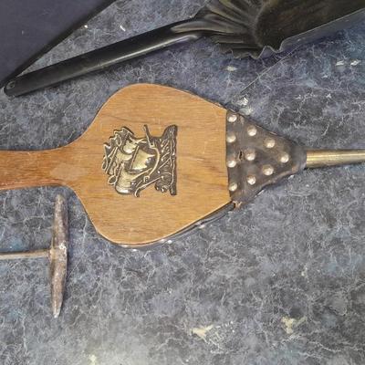 Bellows, an ash shovel and a cookstove lid tool