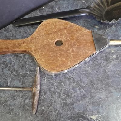 Bellows, an ash shovel and a cookstove lid tool