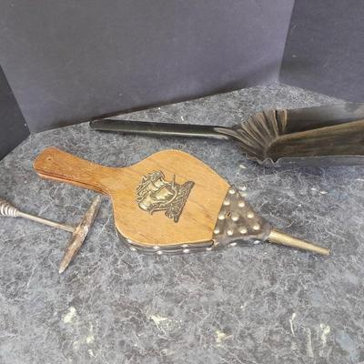 Bellows, an ash shovel and a cookstove lid tool