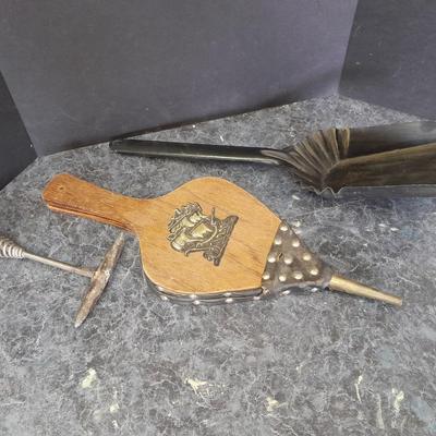 Bellows, an ash shovel and a cookstove lid tool