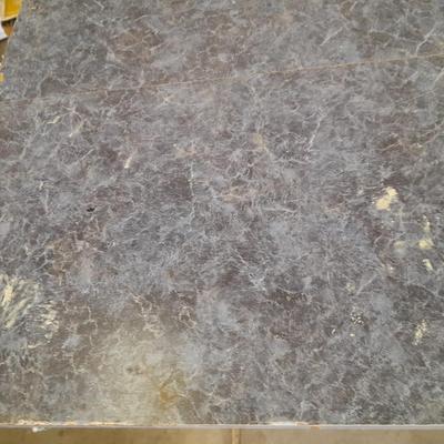 Small folding camper table with two metal chairs