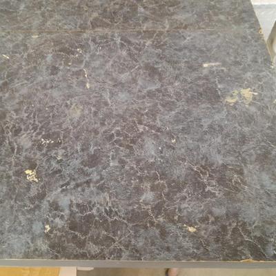 Small folding camper table with two metal chairs