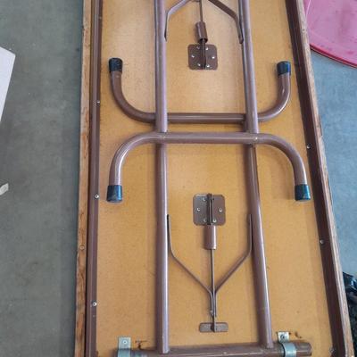 Small folding camper table with two metal chairs