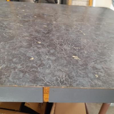 Small folding camper table with two metal chairs