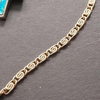 Fashion necklaces Birthstone angels, Turquoise and red colored Cross, and more