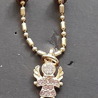 Fashion necklaces Birthstone angels, Turquoise and red colored Cross, and more