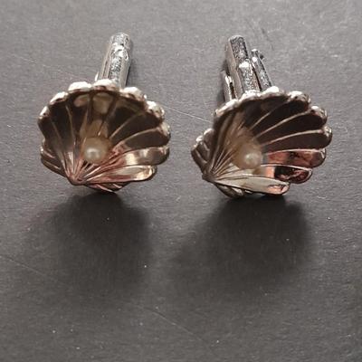 Men's cuff links pocketknife and necklace