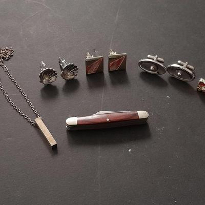 Men's cuff links pocketknife and necklace