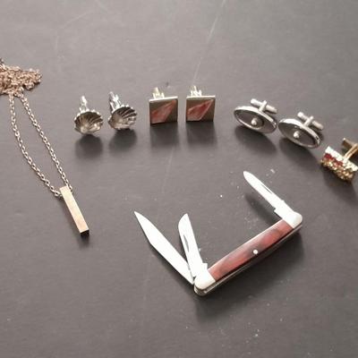 Men's cuff links pocketknife and necklace