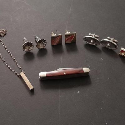 Men's cuff links pocketknife and necklace