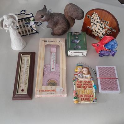Small collectible thermometers, yard Squirrel, angel, Hummingbird fan pull and more