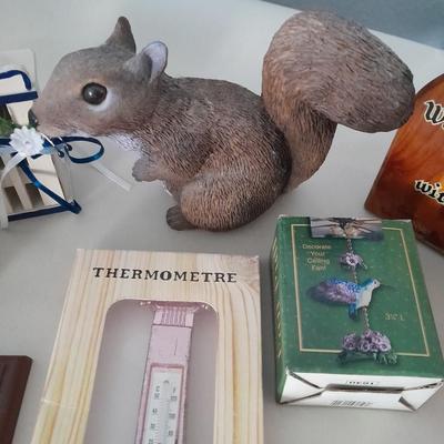Small collectible thermometers, yard Squirrel, angel, Hummingbird fan pull and more