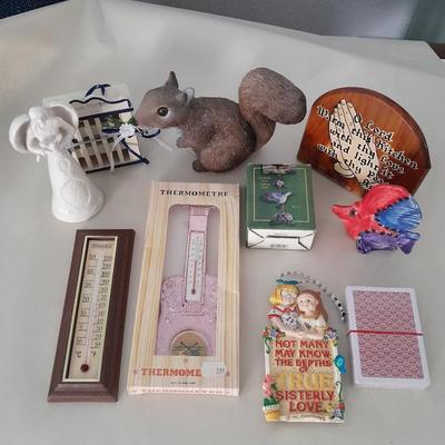 Small collectible thermometers, yard Squirrel, angel, Hummingbird fan pull and more