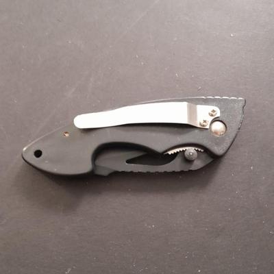 Two pocketknives and a belt sheath