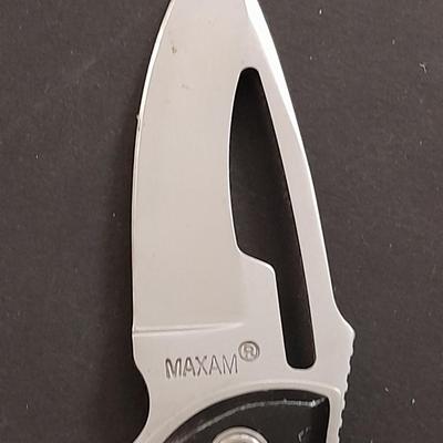 Two pocketknives and a belt sheath