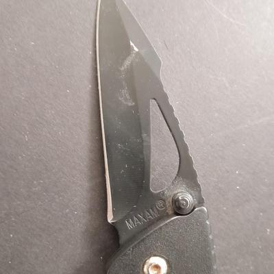 Two pocketknives and a belt sheath