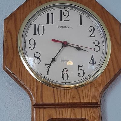 Ingraham wall clock with two metal candle sconces