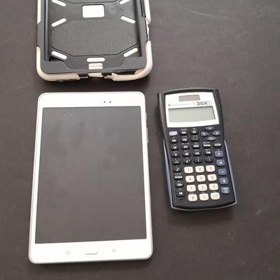 Samsung tablet and Texas Instruments TI-30XIS calculator