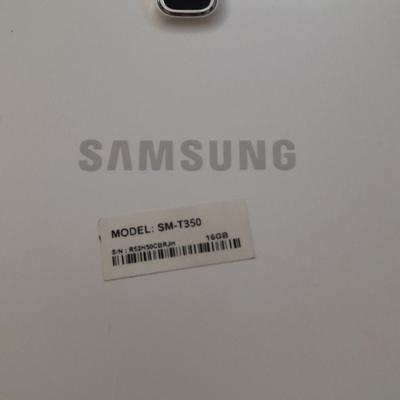 Samsung tablet and Texas Instruments TI-30XIS calculator