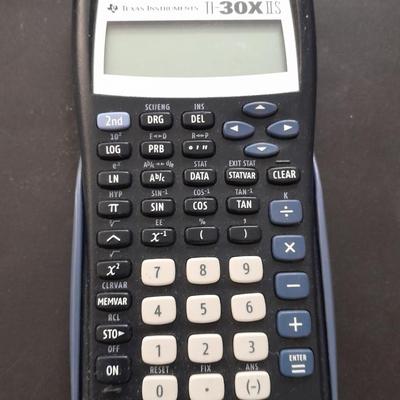 Samsung tablet and Texas Instruments TI-30XIS calculator