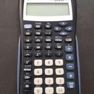 Samsung tablet and Texas Instruments TI-30XIS calculator