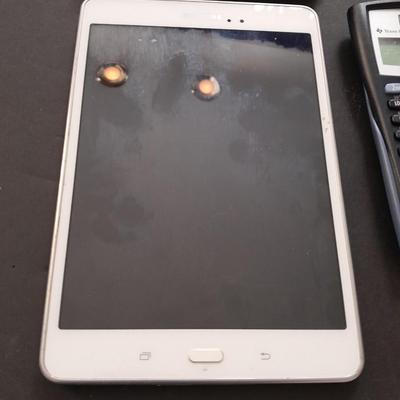 Samsung tablet and Texas Instruments TI-30XIS calculator