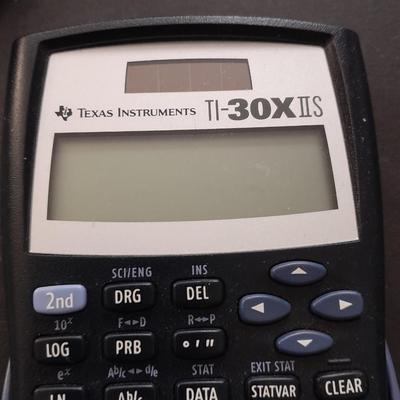 Samsung tablet and Texas Instruments TI-30XIS calculator