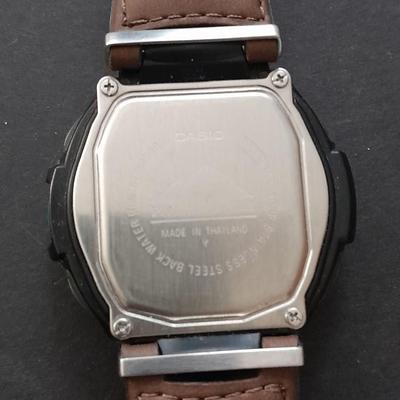 Yashica 35mm camera with case and Casio digital watch