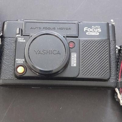 Yashica 35mm camera with case and Casio digital watch