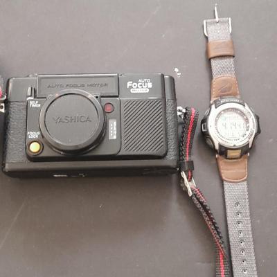 Yashica 35mm camera with case and Casio digital watch