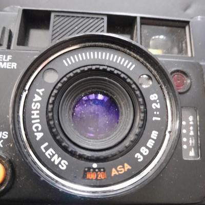Yashica 35mm camera with case and Casio digital watch