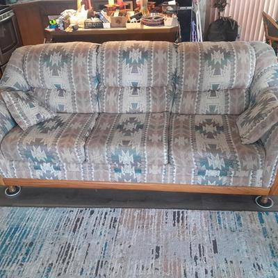 The Loren Mitchell Collection Southwestern style sofa with wood trim front (2)